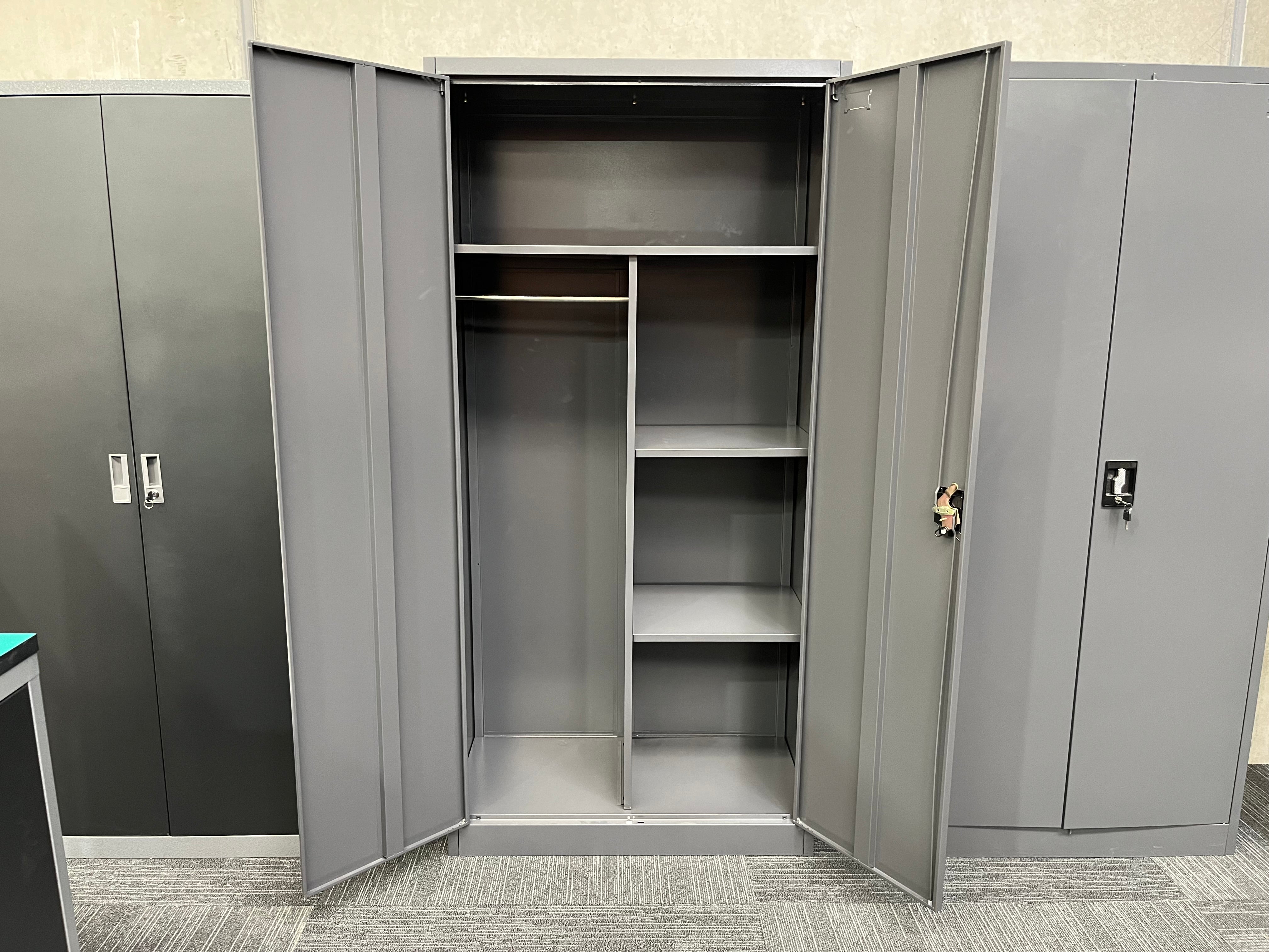 Ripple Grey Metal Cabinets with doors open in a showroom